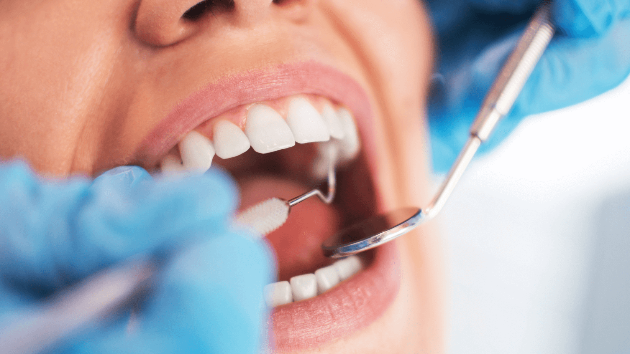 doctor looking in woman mouth